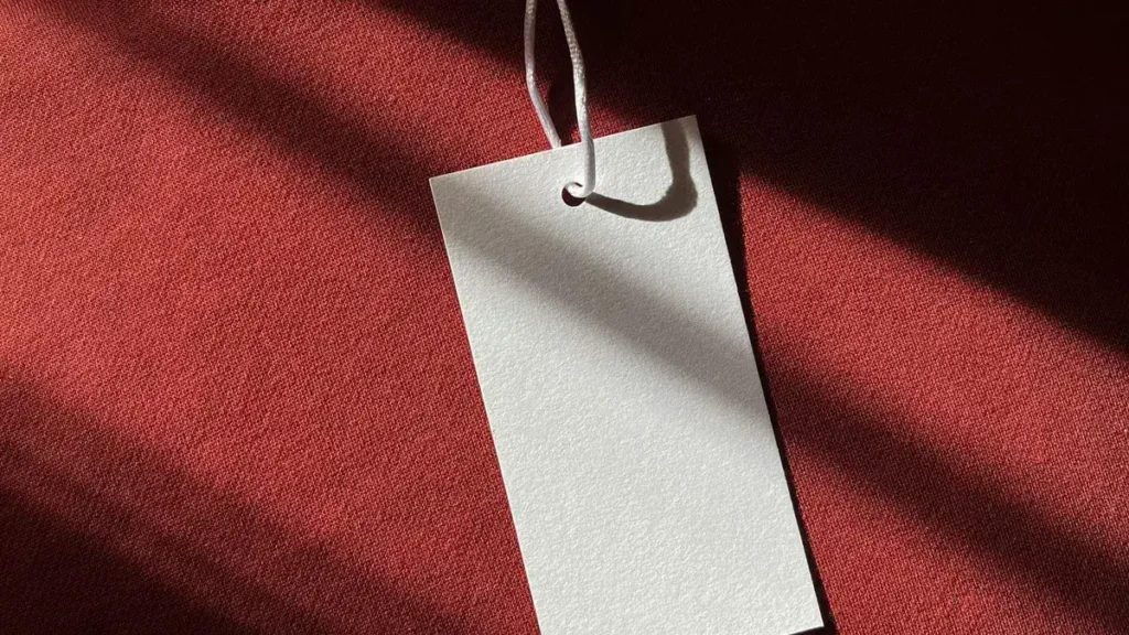 Garment label attached to a blouse as a specification reference