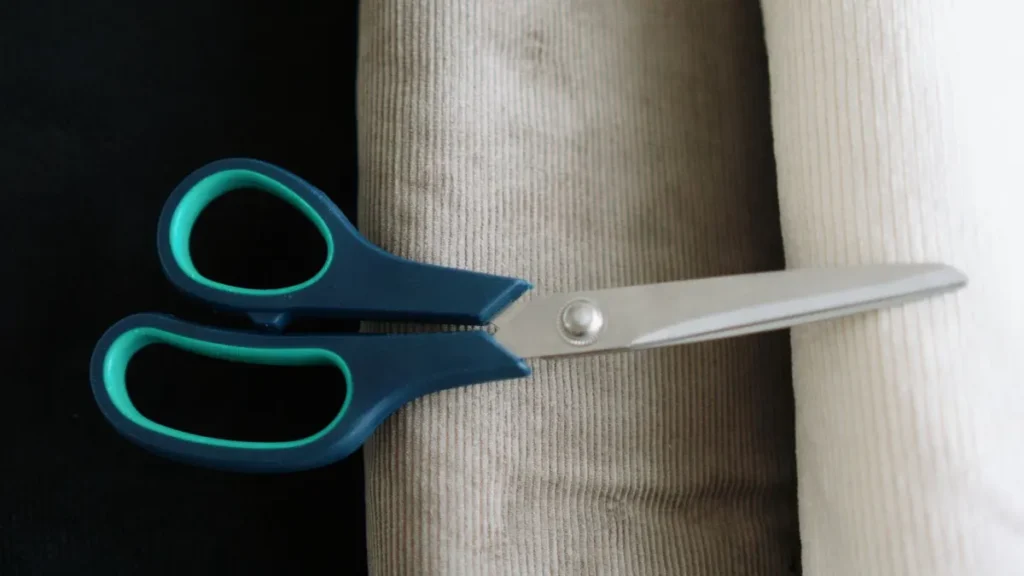 Scissors on mixed fabric textures during a material handling review